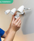 Person installing GU10 120V 25W Halogen Bulbs For Wax Warmer Scent Melt Candle Warmer in a wall fixture, showcasing easy installation.