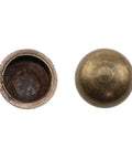 Close-up of bronze caps for screws, part of 8 Piece Super Clean Pure Brass Decorative Screws With Bronze Caps Hella Durable Self Tapping Fasteners For Cabinetry And Wall Panels Quick Install Rust Proof Hardware Upgrade.