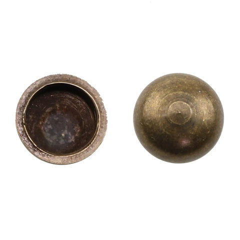Close-up of bronze caps for screws, part of 8 Piece Super Clean Pure Brass Decorative Screws With Bronze Caps Hella Durable Self Tapping Fasteners For Cabinetry And Wall Panels Quick Install Rust Proof Hardware Upgrade.
