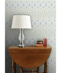 Straight Up Heavy Duty Ikat Stripes Wallpaper With Faux Pvc Free Matte Linen Texture on wall with lamp and wooden table.