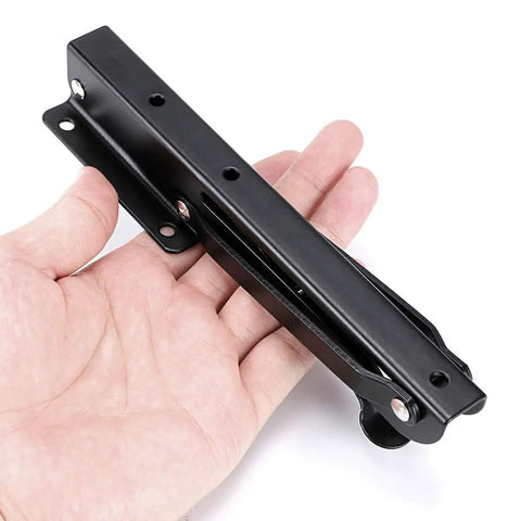 Heavy Duty Folding Shelf Bracket Set Black Metal Triangular Hinge Supports For Wall Mounted Shelves And Benches in hand