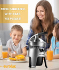 Eurolux 300W Industrial Strength Stainless Steel Electric Citrus Juicer Squeezer on kitchen table with family and fresh juice