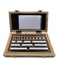 38 Piece Ceramic Rectangular Gauge Block Set Grade 1 Precision Measurement Tools in wooden case for micrometer and caliper checks.