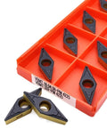 Heavy Duty Carbide Turning Indexable Inserts Vbmt160408 Pm4225 in orange storage box for CNC lathe machine and metal milling.