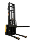 Fully Electric Thin Leg Pallet Stacker With 130 Inch Height Capacity And 3307 Pound Payload featuring dual forks for heavy lifting in tight spaces.