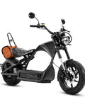High Output 4000W Electric Motorcycle With A Dual 60V Battery Rig delivering 110 miles, featuring a sleek black design and comfortable seat.