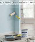 Heavy Duty Synthetic Fiber Paint Roller Cover With Dual Yellow Guide Strips For Flawless Latex Application On Walls Drywall And Ceilings Smooth Operator No Skip Drip Free Weekend Warrior Gear in action applying paint to corner