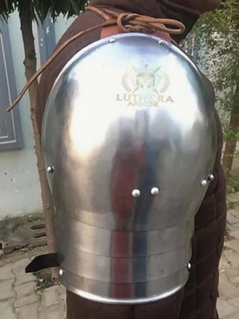 Close-up of Rugged Medieval Pauldrons Shoulder Armor For Knights, Steel Armor For SCA And LARP, with leather straps and buckles