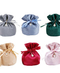 Collection of colorful plush gift bags with drawstring closures, ideal for candy packaging and party supplies. Plush Gift Bags 20 Pack for Candy Packaging and Party Supplies Ideal for Wedding Planners and Event Organizers Drawstring Closures Cute and Stylish Packaging Solution
