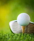 Golf club ready to strike ball on Pro Grade Bamboo Golf Tees Two And Three Quarters Inch Pack Of One Hundred Built To Last On The Course