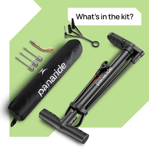 Versatile Handheld Bike Pump With Dual Presta And Schrader Valves and accessories shown on green background