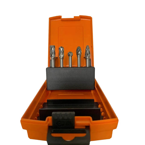Five Piece Heavy Duty Carbide Rotary Burr File Set With One Quarter Inch Shank For Die Grinder Drill in orange case, showing polished burrs.