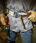 Person wearing Heavy Duty Tool Belt With Mildew Resistant Cotton Polyester Webbing And A Forged Quick Release Buckle For Fast Disengagement On The Job Medium Fits 30 To 44 Inch Waists Great For Ironworkers Framers Carpenters And Electricians