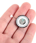 Six Piece Quartz Watch Movement Replacement Parts Kit Sl28 shown in hand for size reference