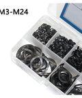 Box Of 129 Wave Washers And Spring Washers Set In Black Elastic Metal Gasket Assortment For M3 To M24 Bolts, Durable And Easy To Install, Perfect For Electrical, Automotive And Marine Applications. Open box of black M3-M24 washers organized by size.