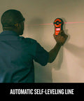 Person using 2-In-1 Laser Level And Stud Sensor Pro Grade Tool with self-leveling beam and 20 foot visibility on wall