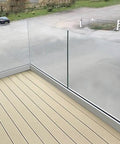 Rock Solid Heavy Duty Aluminum Glass Spigot Clamps For Pool Fencing And Deck Guardrails Silver Finish installed on a balcony.