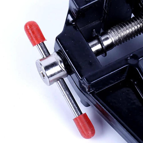 Close-up of Compact Mini Vise Clamp With A Rock Solid Hold For Woodworking Carving And Jewelry DIY Tasks, showcasing black finish and adjusting screw.