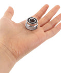Hand holding DIN To Yoke Valve Adapter For Scuba Tanks Two Pack Pro Grade High Accuracy Anti Leak Design 230 Bar Capacity