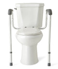 Foldable Aluminum Toilet Safety Rail With Armrests For Seniors And Mobility Support Non Slip Bathroom Grab Bar installed on a toilet.