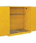 No Slouch Double Drum Safety Cabinet For Flammable Liquids With Manual Close and Drum Rollers, yellow, open with adjustable shelf.
