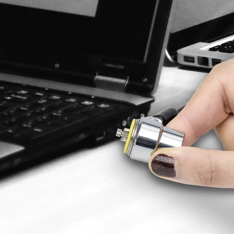 Secure 6 Foot Cut Resistant Laptop Lock Cable With 360 Degree Rotating Lock For 7x3mm Wedge Slot Laptops in use