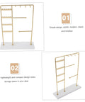 Spin Your Daily Drip Easily With This Smooth Rotating Jewelry Tree Stand Constructed From Premium Iron And Solid Marble For Necklaces And Earrings Storage, showing gold metal arms and solid marble base.