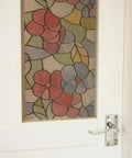 Lisboa Red Self-Adhesive Privacy Glass Window Film For Windows, Doors, Showers, And Glass Surfaces installed on a door.
