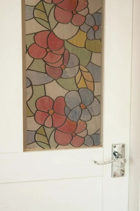 Lisboa Red Self-Adhesive Privacy Glass Window Film For Windows, Doors, Showers, And Glass Surfaces installed on a door.