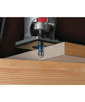 Bosch 1/4 in. x 3/4 in. high-speed steel 1-flute pilot panel straight router bit installed in router