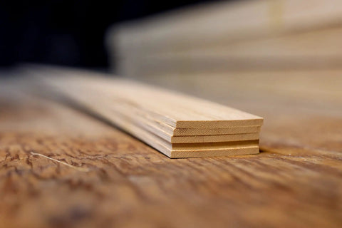 Close-up of flattened bamboo for bow making and woodworking build bows and bendable projects with a back of bow layer or core lamination.