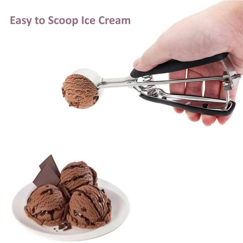 Hand using Go To 2 Tbsp Cookie Scoop Ice Cream Scooper With Trigger Release 18 8 Stainless Steel dough scoop for chocolate ice cream