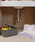 Ultimate 115-Piece Spring Band Hose Clamp Kit For Fuel Lines. Heavy Duty carbon steel kit under sink, open case visible