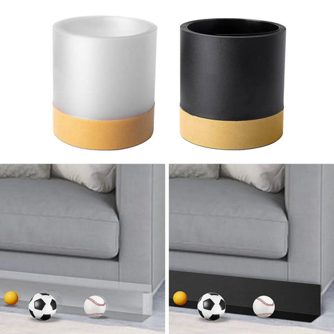 Under Couch Blocker Sofa Guard Sectional Connector Bumper That Stops Items From Sliding Under Furniture No More Mess On Beds Carpets And Wood Floors Thick Durable Barrier With Easy Removal For Couches Sofas Dressers And Bed Frames in black and white variants, shown blocking balls under a sofa.