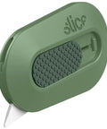 Compact Ceramic Box Cutter With Finger Safe Edge Zirconium Oxide Blade Manual Retracting Design Ultra Safe Box Opener Lasting 11x Longer Than Metal Great For Opening Packages 1 Pack Sage shown in close-up view with green handle and blade.