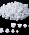 Four Sizes White Plastic Hole Plugs For Cabinet And Furniture Round End Caps For Screw Holes Three Sixteenths Inch Five Sixteenths Inch Three Eighths Inch One Half Inch Ideal Covers For Kitchen Doors Shelves displayed on black background