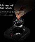 Close-up of removable hopper of Badass Electric Coffee Grinder With 150 Tight Adjustments, Slick Stainless Steel Housing, And Knockout Uniform Grind For Espresso Pour Over And French Press In Matte Black.