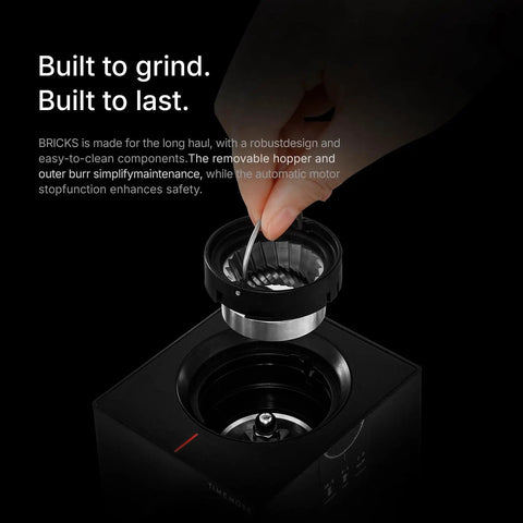 Close-up of removable hopper of Badass Electric Coffee Grinder With 150 Tight Adjustments, Slick Stainless Steel Housing, And Knockout Uniform Grind For Espresso Pour Over And French Press In Matte Black.