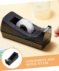 Six Station Blue Desktop Tape Dispenser Set With Six Premium Adhesive Rolls For Legit Heavy Duty Packing Smooth Desk Organization And No Sweat Sealing Top Shelf Workspace Solution - Black tape dispenser in use with adhesive roll visible.