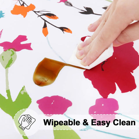 Round Fitted Tablecloth With Elastic Edge No Slip Snug Fit Waterproof Oil Proof Vinyl Backed Table Cover For 36 To 44 Inch Round Tables Perfect For Dinner Outdoor Picnic Flowers being wiped clean