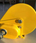 Heavy Duty Electric Hoist 2600 LB Manual Winch hand crank brake pully in yellow, designed for lifting in warehouses and garages.