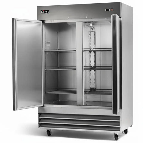Rock Solid All Stainless Steel Two Door Reach In Commercial Freezer, 49 Cu Ft Capacity with open doors, adjustable shelves and casters.