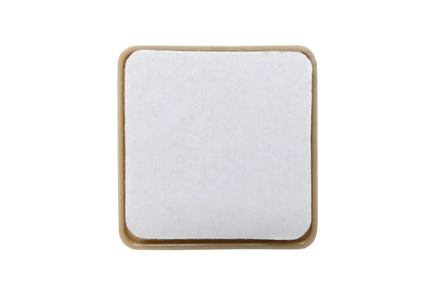 No Sweat Top Tier 2 Inch Square Furniture Sliders With Self Adhesive Backing beige glide top view, ideal for furniture movement.