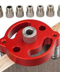 Boss Grade Self Centering Doweling Jig Kit With Knockout Wood Drill Guide showing red alloy body and various drill guides.