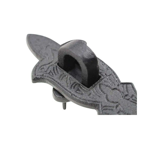 Close-up of Colonial Style Black Wrought Iron Hasp Door Lock Latch Eight And A Quarter Inch with decorative design detail.