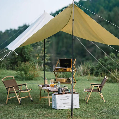 Outdoor setup with Ultralight Carbon Fiber Telescoping Tarp Poles For Tent Awning And Canopy supporting a tarp cover.