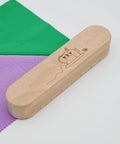 Wooden Clapper Tool For Pro Sewing And Quilting Nine Point Five Inch Hardwood Ironing Clapper To Set Seams And Creases Ideal For Quilting Projects And Seam Sewing Durable Craft Wood Block For Crisp Finish on fabric background