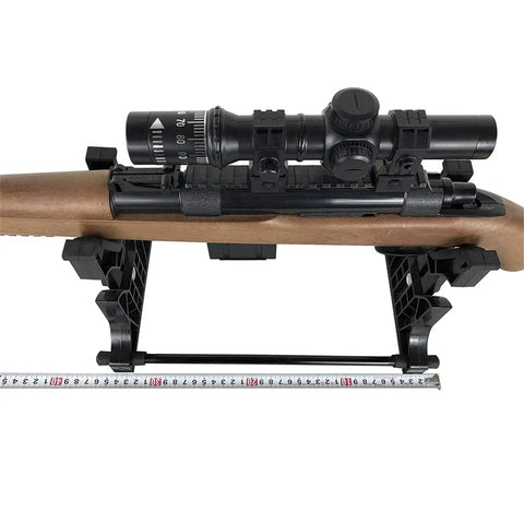 Portable Rifle And Handgun Display And Cleaning Stand For Airguns holding wooden rifle, side view, on table mount.