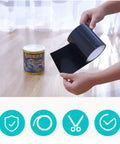 Someone holding Heavy Duty Black PVC Repair Sealant Tape waterproofing leaks, showing its strong adhesion in a home setting.
