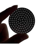 Top Shelf Reusable Espresso Puck Screen Built From Heavy Duty 304 Stainless Steel Fits 51mm 54mm And 58mm Baskets held in hand.
